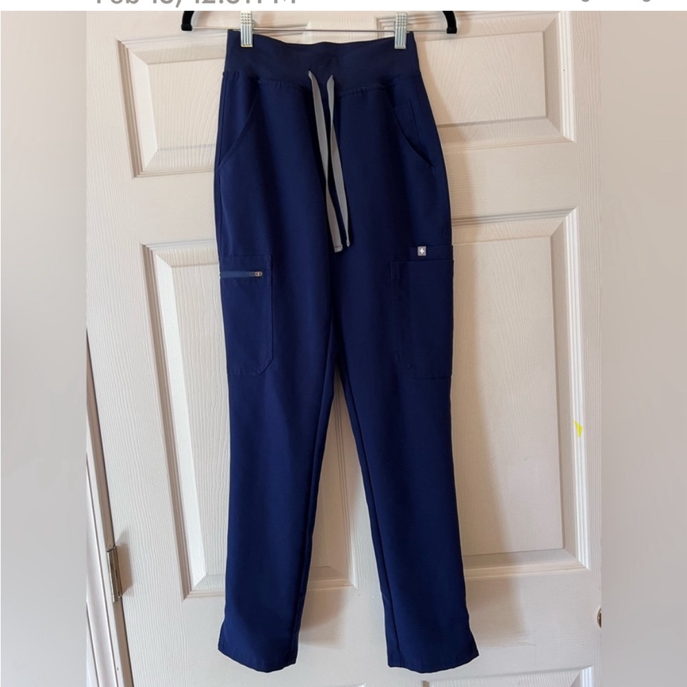 FIGS Navy High Waisted Yola scrub bottoms.